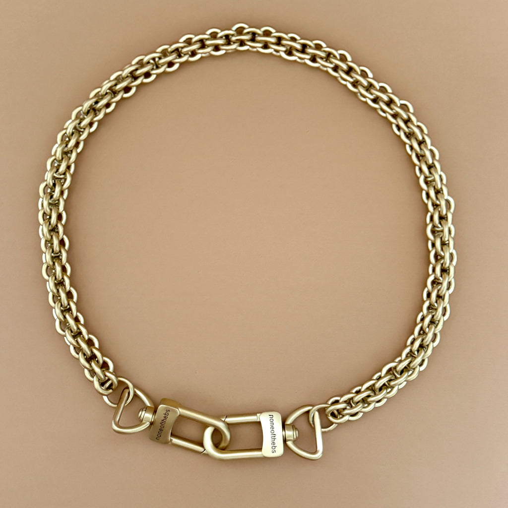 Veil matte gold leather shoulder strap with subtle metallic finish